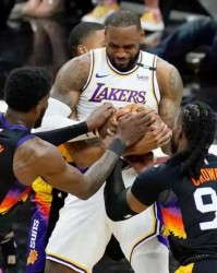  布克39分太阳加时击退国王  